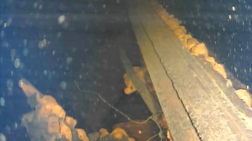 Restos de una pared en el interior del reactor 3 de Fukushima, con restos de lo que parece ser combustible fundido