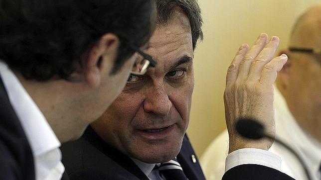 El presidente de la Generalitat, Artur Mas, junto al secretario de organización de CDC, Josep Rull