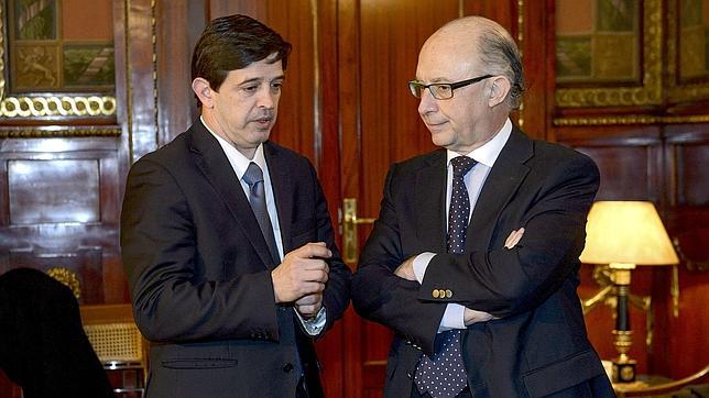 Cristóbal Montoro y Javier González