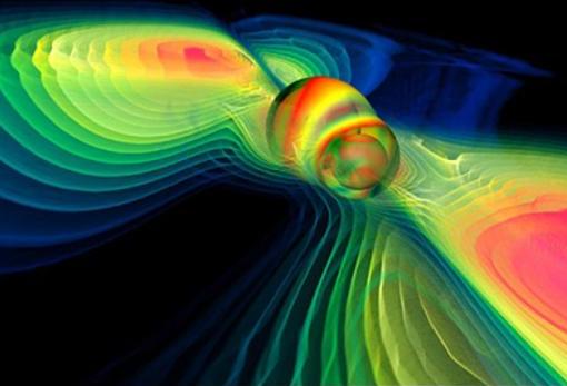 Simulación por ordenador de la fusión de dos agujeros negros y de ondas gravitacionales liberadas