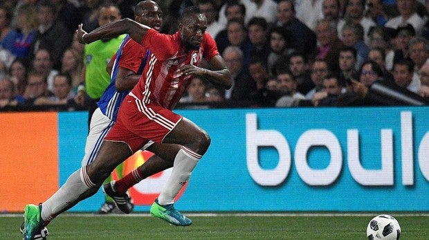 Usain Bolt, durante un partido amistoso
