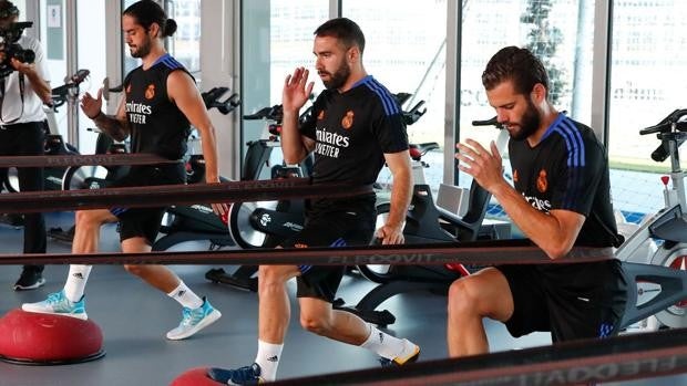 Isco, Carvajal y Nacho, durante el entrenamiento de hoy