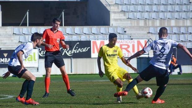 Un momento del partido del Conquense en Villarreal