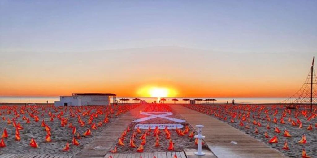 La playa de la Patacona amanece con 53.000 banderas de España en homenaje a las víctimas del coronavirus