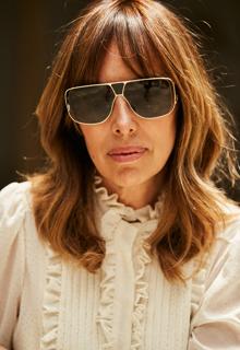 The designer Teresa Helbig with one of the glasses she has designed with MÓ