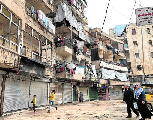 Niños jugando en el barrio kurdo del centro de Alepo