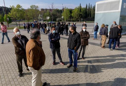People waiting to be vaccinated with AstraZeneca at the Miguel Delibes Cultural Center in Valladolid
